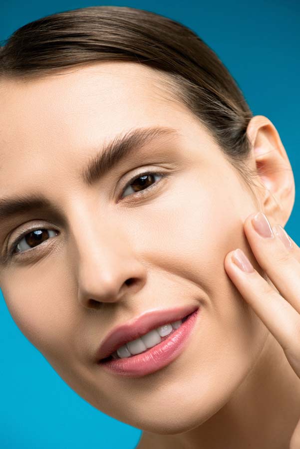 Woman with fresh skin after glycolic acid peel with retinol