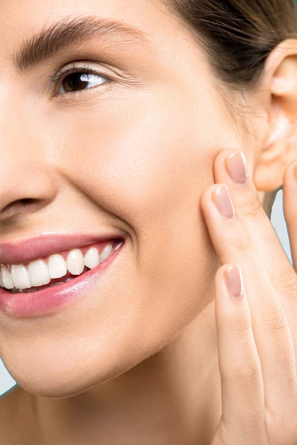 Woman with young looking skin after glycolic acid peel